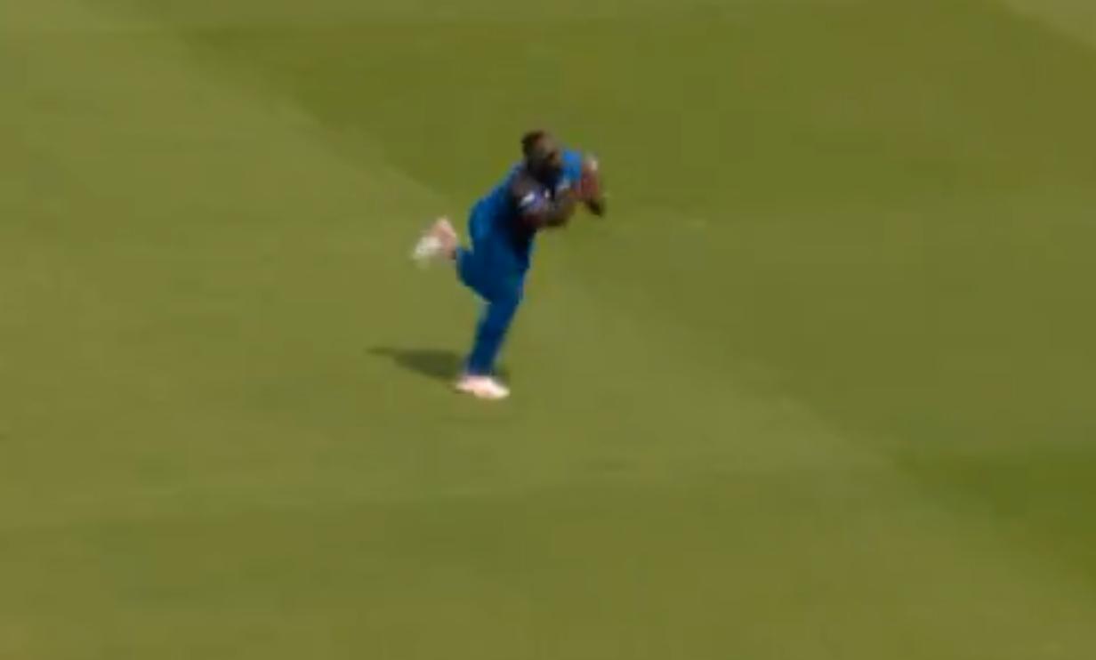 Russell with a running catch [X]
